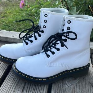 New. Never worn white leather doc martins.